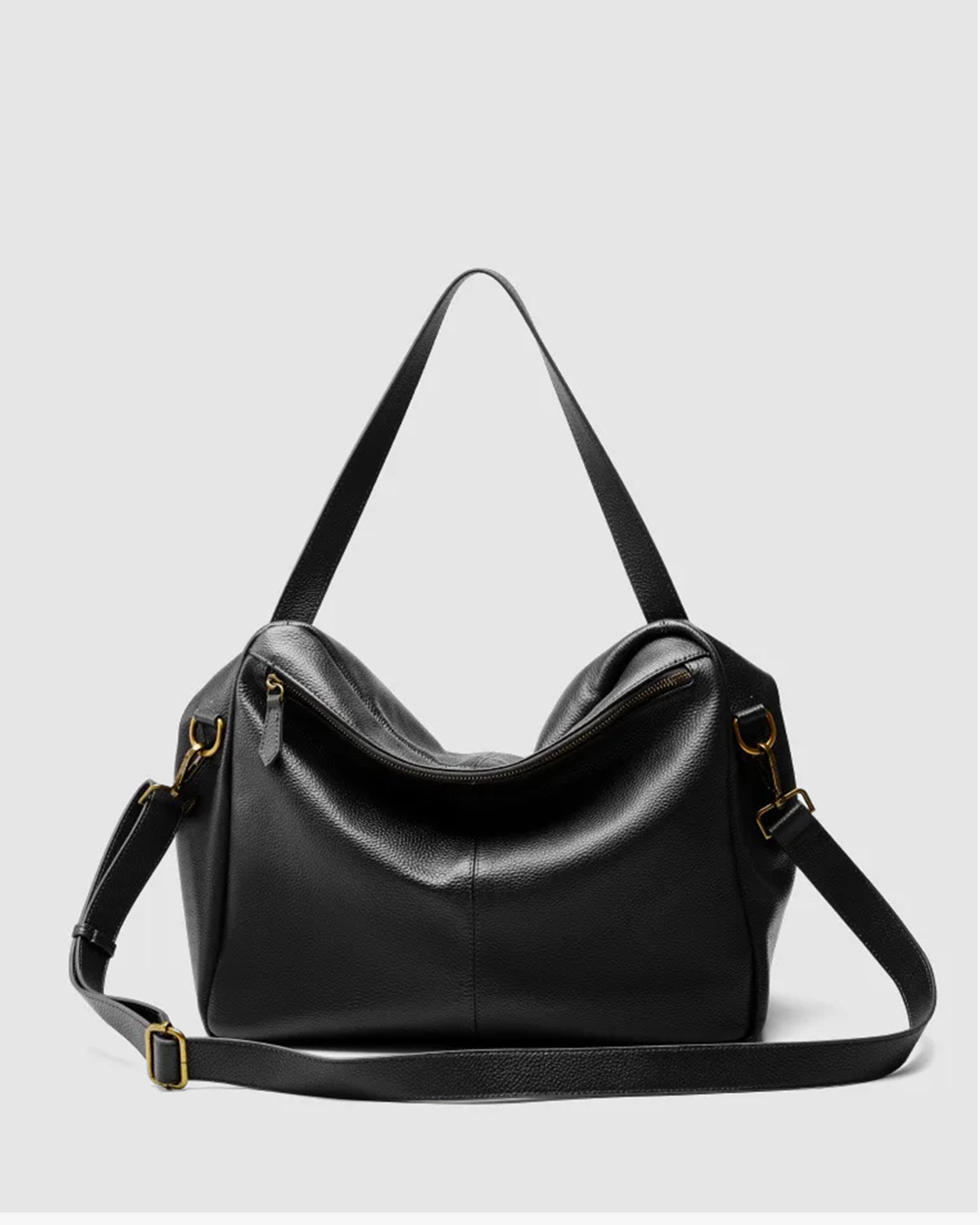 Bolso de piel suave negro con correas ajustables y cierre de cremallera para uso diario
