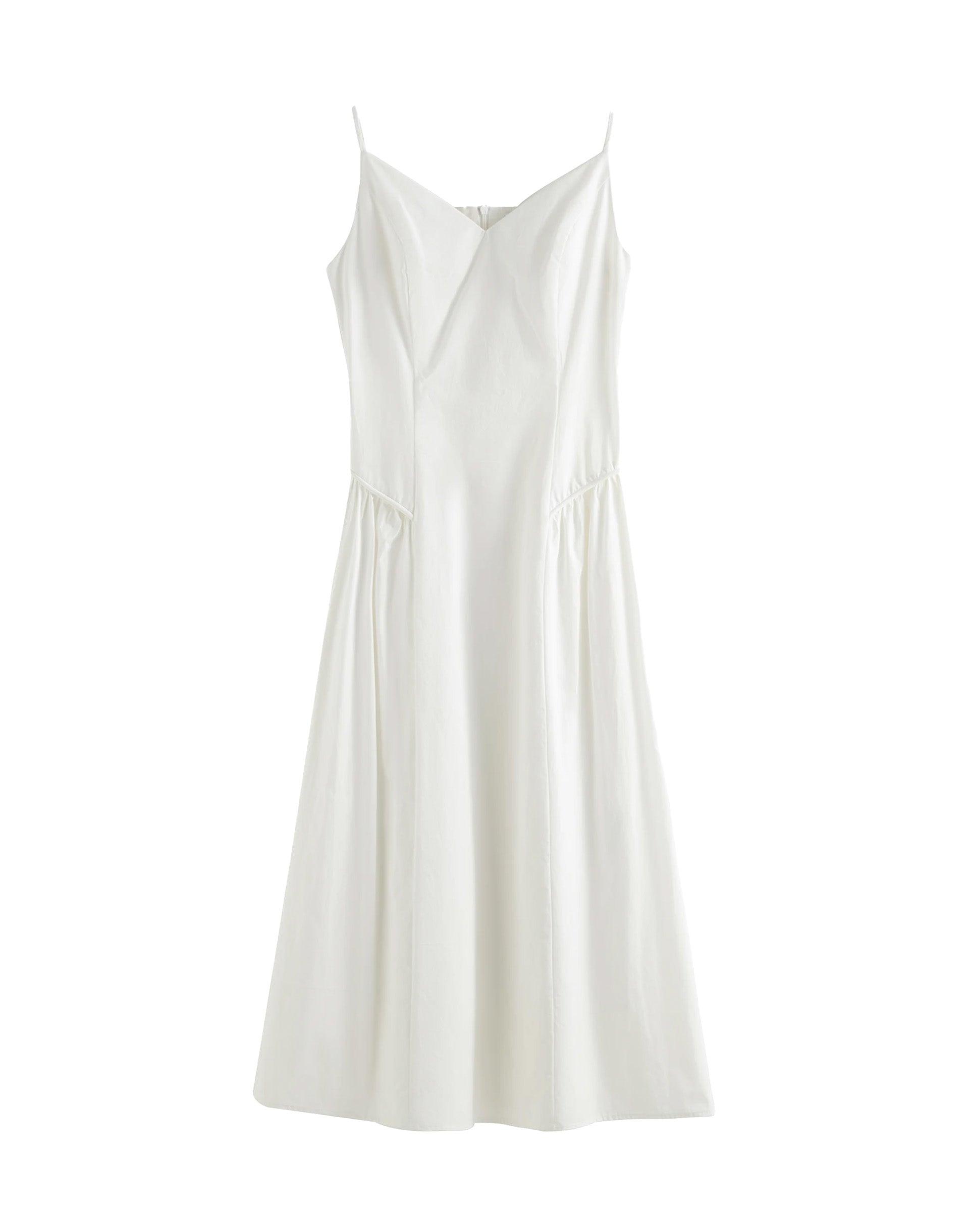 Vestido verano profesional blanco con tirantes y detalles elegantes para un look sofisticado